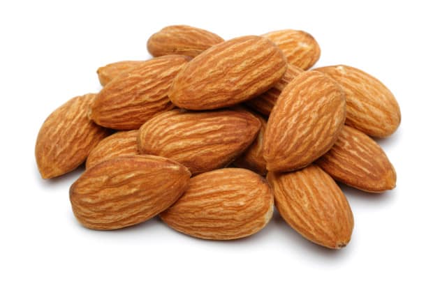 almonds on white background.